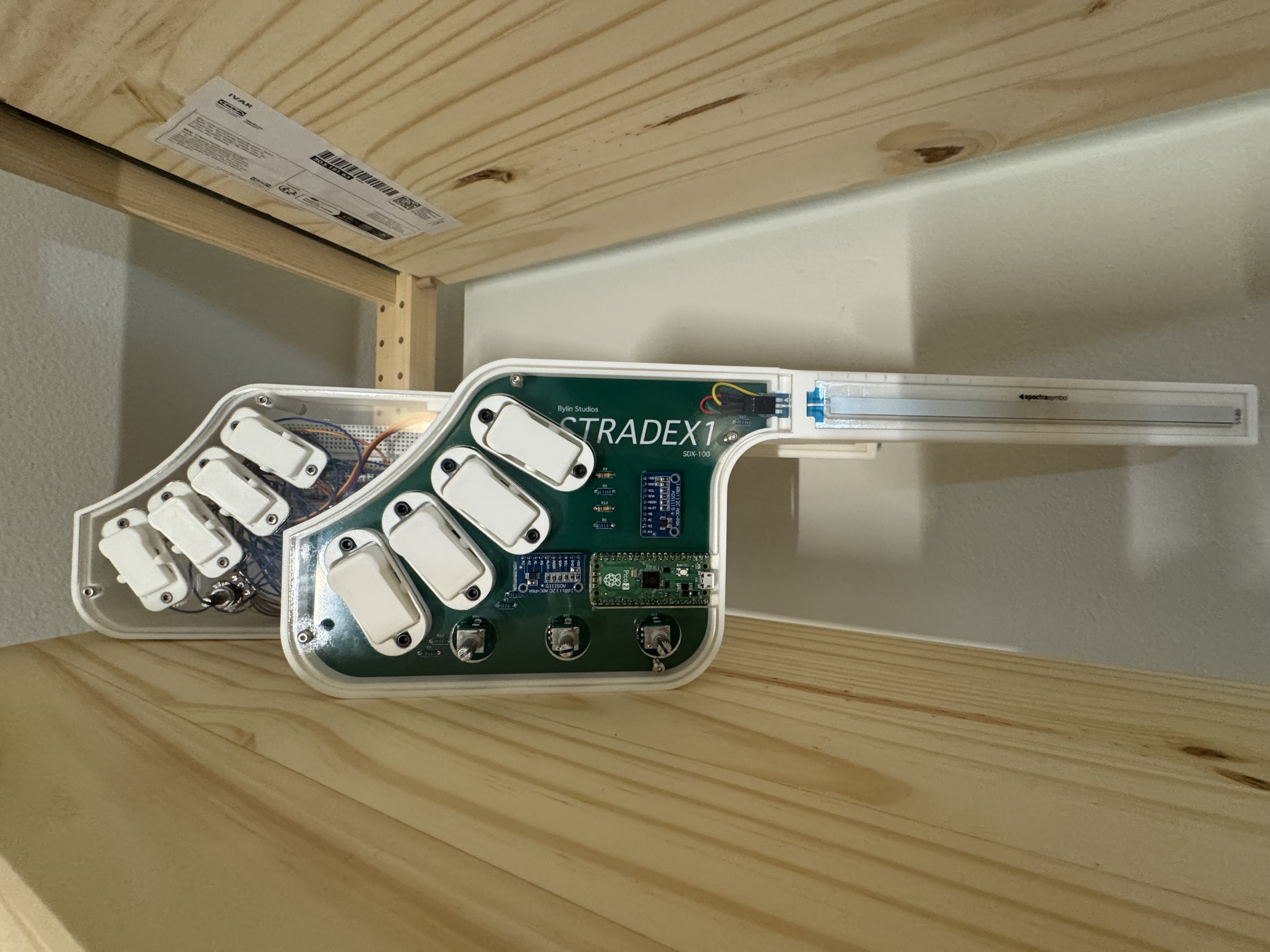Prototype 1.11 (left) and Prototype 1.20 (right), both RP2350-based